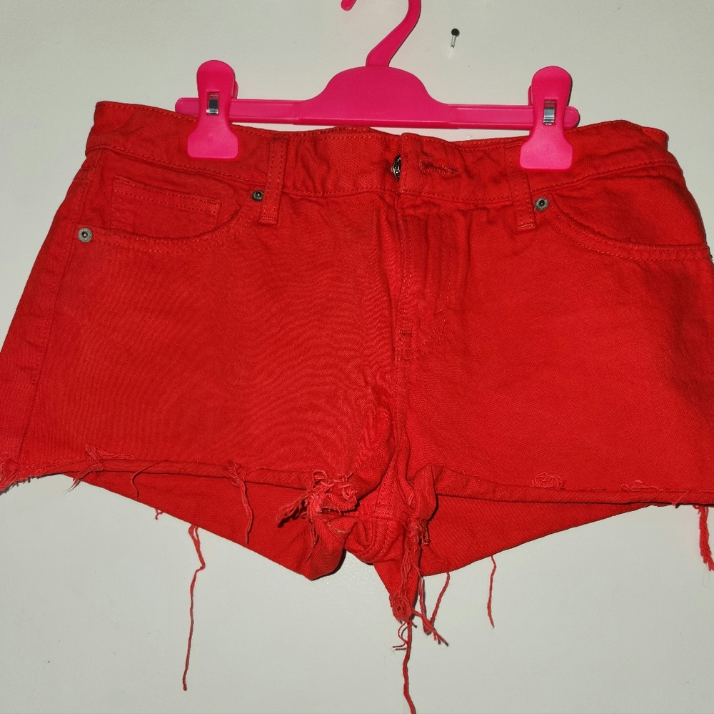 Red cutoff Lucky shorts